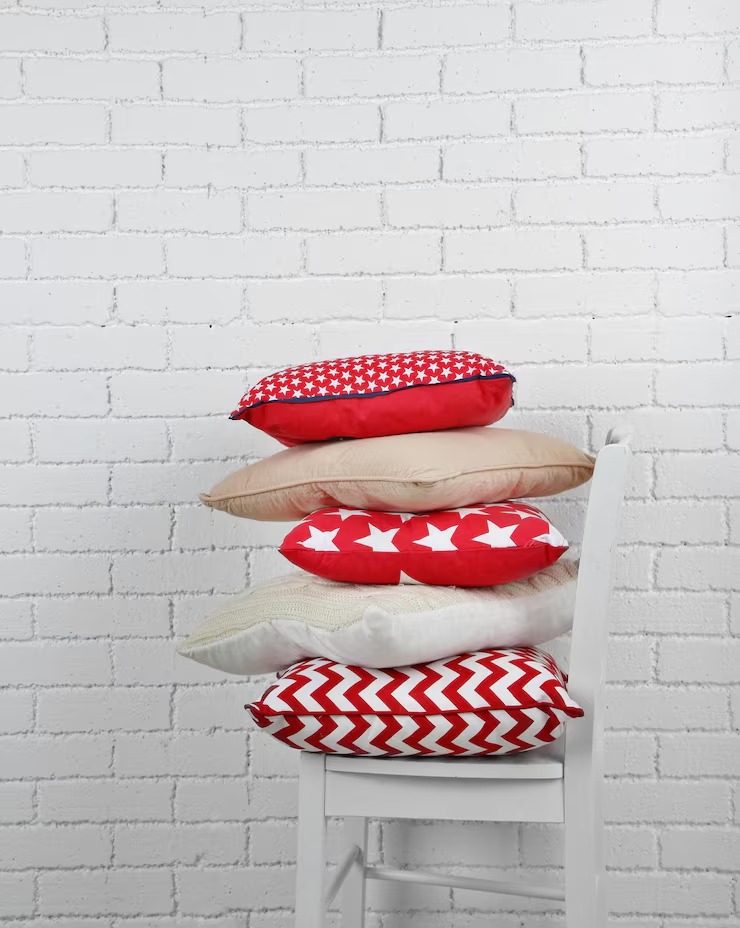 Cushions Covers Colorful Pillows Chair White Bricks Wall 2 by Orient Uniforms for customers in Dubai, Abu Dhabi, Sharjah, Ajman and across the UAE